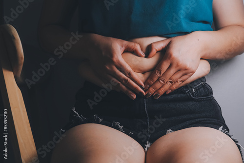 fat woman, fat belly, chubby, obese woman hand holding excessive belly fat with measure tape, woman diet lifestyle concept