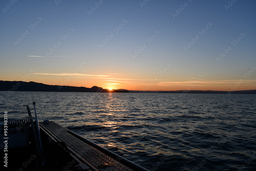Sunrise on the Columbia river, viewed from a fishing boat. Sunrise on the Columbia river, viewed from a fishing boat.
