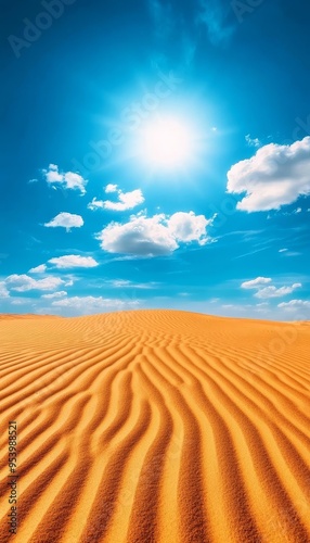 Stunning desert landscape with rippling sand dunes under a bright sun and clear blue sky, capturing the essence of arid beauty.