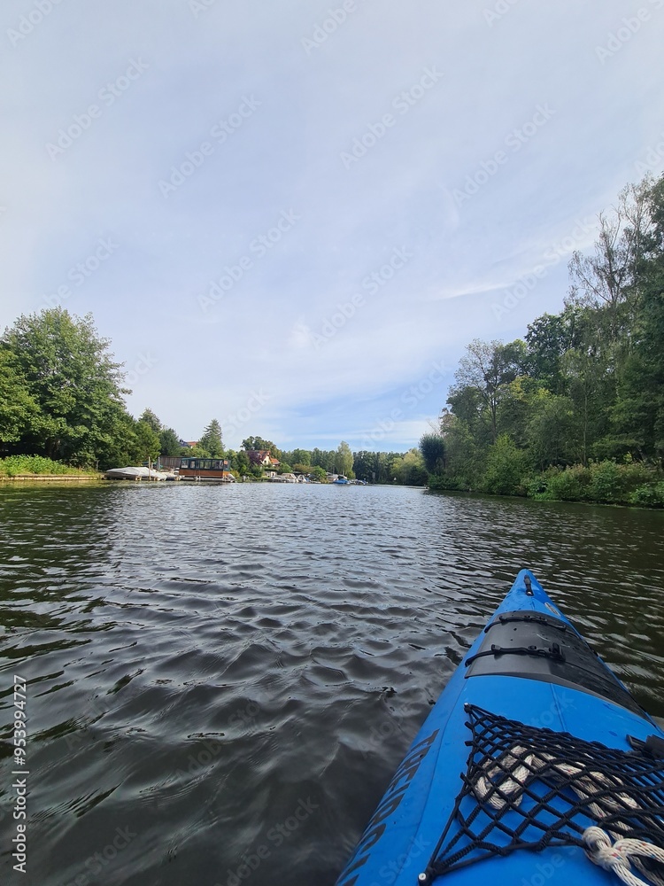 Fototapeta premium View on the Müggelspree River on a sunny day from a Kayak in Berlin Rahnsdorf