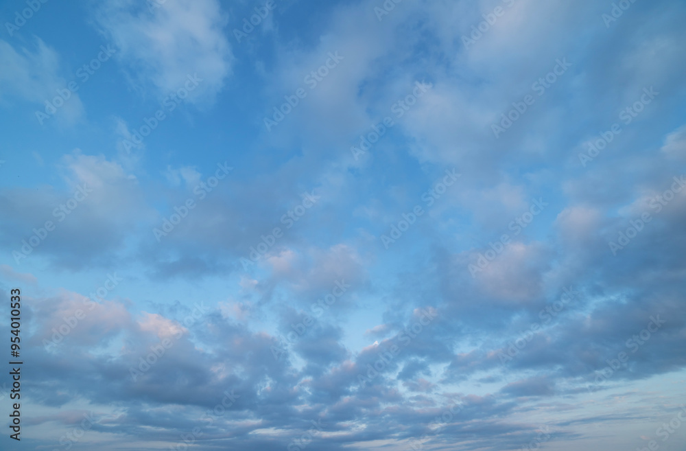Beautiful tender sunrise sky with clouds. Sky background. Beautiful tender sunrise sky with clouds. Sky background.