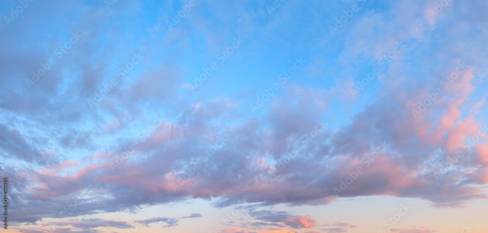 Fototapeta premium Beautiful blue sky with a few clouds at sunset and sunrise