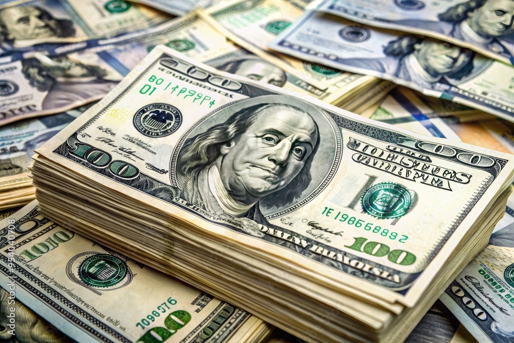 Close-Up Of A Pile Of Money Consisting Of A Stack Of Hundred Dollar Bills And A Few Twenty Dollar Bills. Close-Up Of A Pile Of Money Consisting Of A Stack Of Hundred Dollar Bills And A Few Twenty Dollar Bills.
