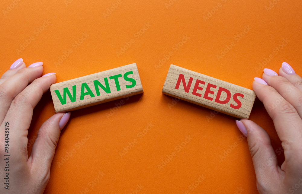 Wants and Needs symbol. Concept word Wants and Needs on wooden blocks ...