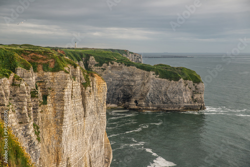 West coast of France. Clifs of Etreta. Rocks on the coast of the English channel strait. Etretat village, Normandy region.