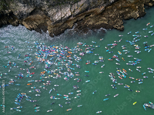 Принти на полотні Brixham, Torbay, South Devon, England: DRONE VIEWS: Participants gather at Fishcombe Cove as they attempt to beat the World Record for the highest gathering of paddleboarders at sea (PHOTO 3)