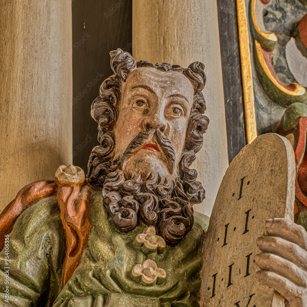 Moses with the ten commandments, a wood carving