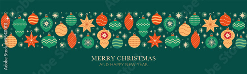  Christmas seamless decorative border with red, gold and green various vintage tree ornaments on dark green background.