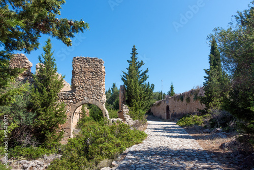 The fortress in Assos village, Kefalonia island, Greece, inside which there are the buildings of the abandoned prison  photo