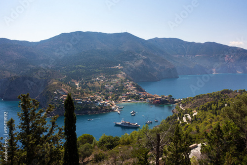 View down to the beautiful bay of Assos village, Kefalonia island, Greece, from the surrounding hills photo