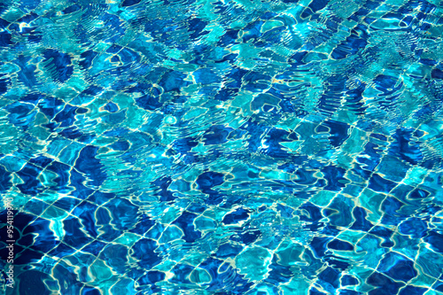 blue water in swimming pool background photo