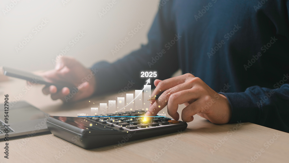 Businessman analyzes business goals and growth in 2025, strategy digital marketing, profit income, economy, stock market trends and business, technical analysis strategy.