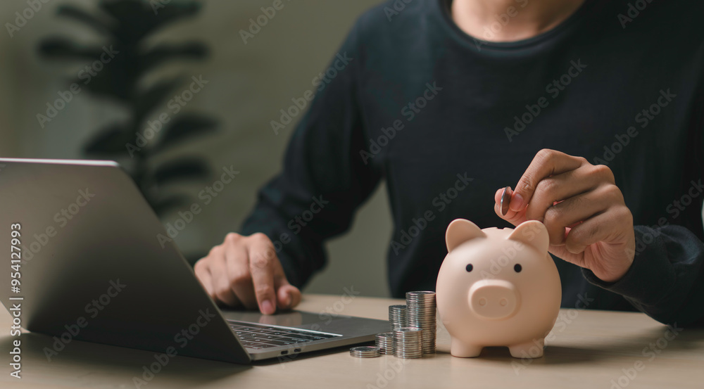 person placing a coin into a piggy bank, symbolizing saving money, financial planning, online banking and economic. stack coins the piggy bank of accumulating wealth, managing expenses and investment.