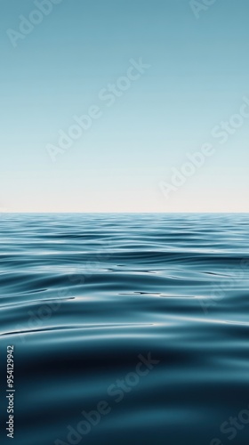 Wallpaper Mural Calm Ocean Surface with Gentle Waves and a Clear Blue Sky Torontodigital.ca