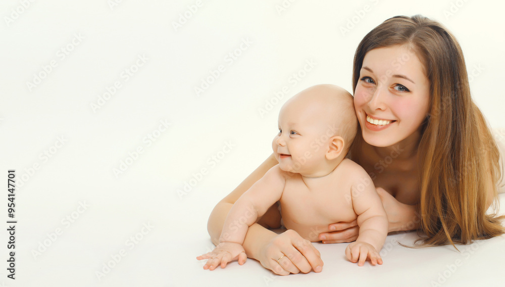 Portrait of happy smiling young mother playing with cute baby lying together on white background Portrait of happy smiling young mother playing with cute baby lying together on white background