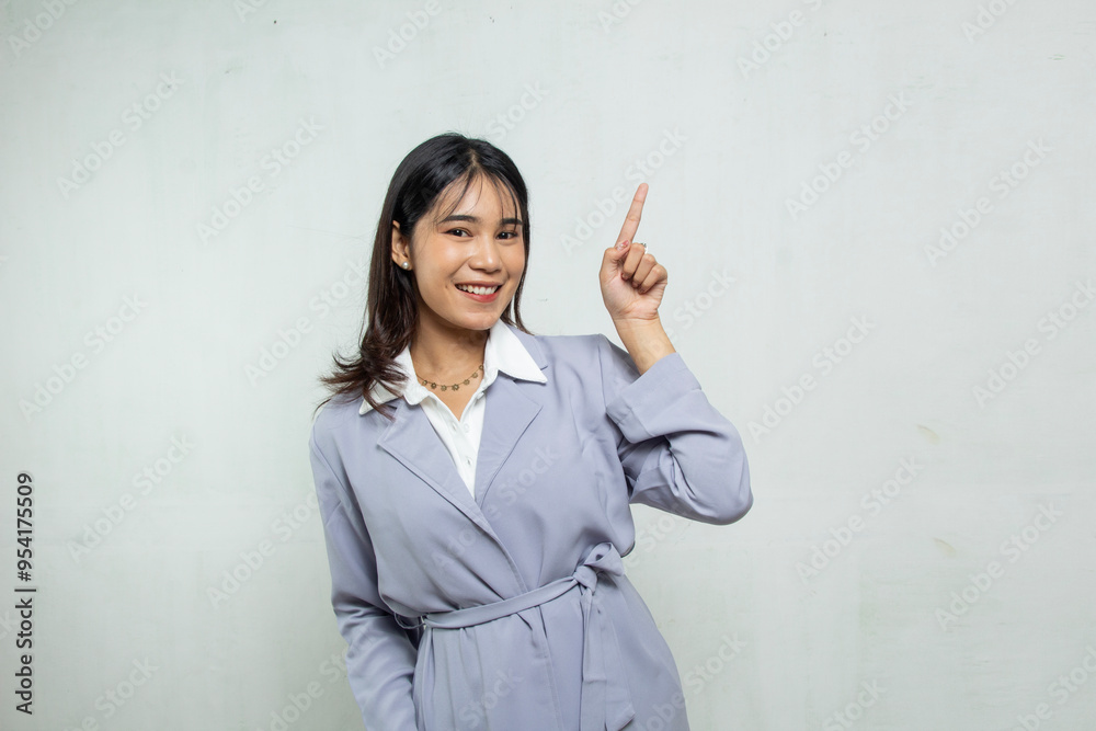 Beautiful young business woman pointing forward while smiling at camera, woman office advertisement mockup purple blue outdoor blazer dress isolated on white Beautiful young business woman pointing forward while smiling at camera, woman office advertisement mockup purple blue outdoor blazer dress isolated on white