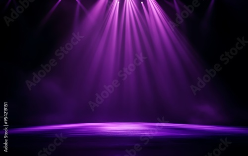 Vibrant purple stage lights illuminating a dark space, creating a dramatic atmosphere for performances and events.