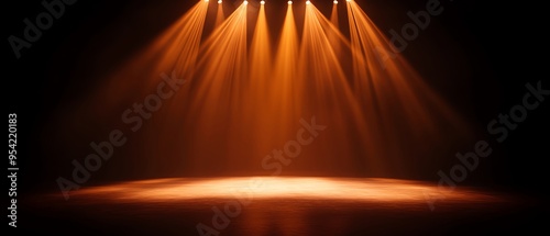 Warm orange spotlight illuminating a stage, creating a dramatic and inviting atmosphere for performances and presentations.