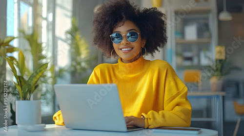Happy woman working on a la...