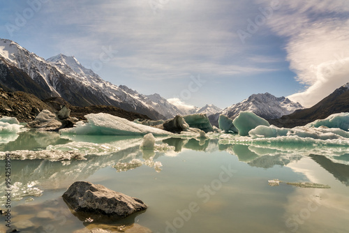 Icebergs on the alpine Tasman lake at the river end in Aoraki Mt Cook National Park photo