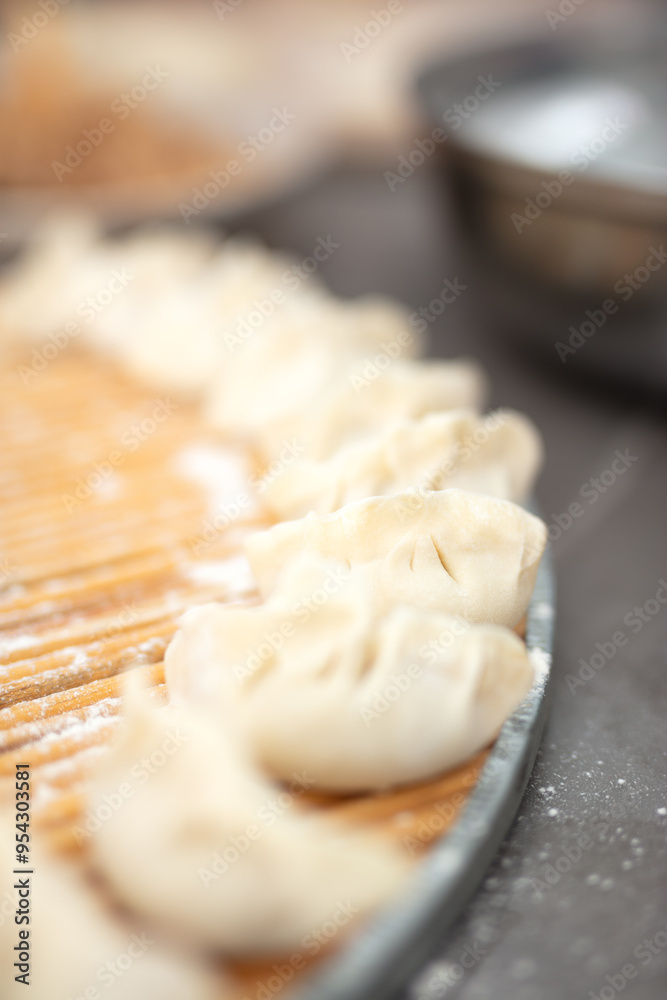 The dumplings are ready to be put into the pot The dumplings are ready to be put into the pot