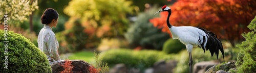 A serene moment in a garden featuring a person meditating near a majestic crane surrounded by vibrant foliage.