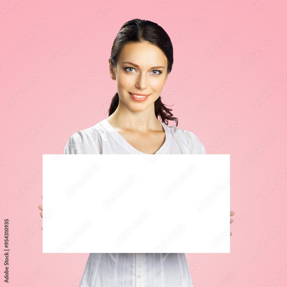 Happy smiling beautiful businesswoman showing blank mockup signboard with copy space area for ad slogan text, isolated over rose pink background. Confident business woman holding mock up paper board. Happy smiling beautiful businesswoman showing blank mockup signboard with copy space area for ad slogan text, isolated over rose pink background. Confident business woman holding mock up paper board.