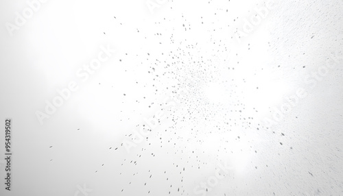 A mostly blank background with a small, centered design, like a tiny star or dot, emphasizing simplicity and space