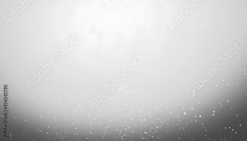 A mostly blank background with a small, centered design, like a tiny star or dot, emphasizing simplicity and space