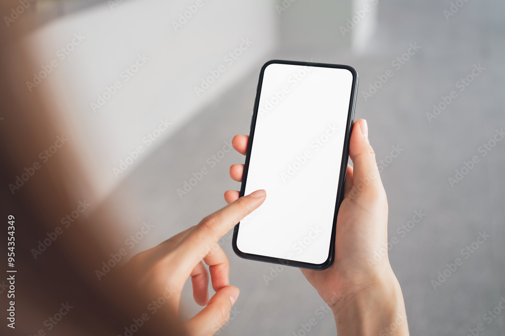 Hand holding smartphone mockup of blank screen, Take your screen to put on advertising. Hand holding smartphone mockup of blank screen, Take your screen to put on advertising.