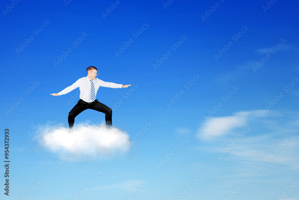 Success concept of a businessman on a cloud Success concept of a businessman on a cloud