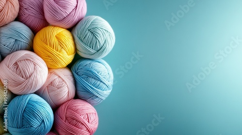  A colorful ball of yarn on a blue backdrop with space for text or an image