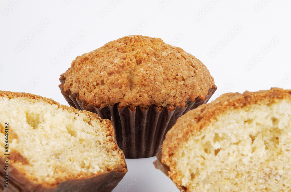 Whole and half muffin on a white background. Whole and half muffin on a white background.