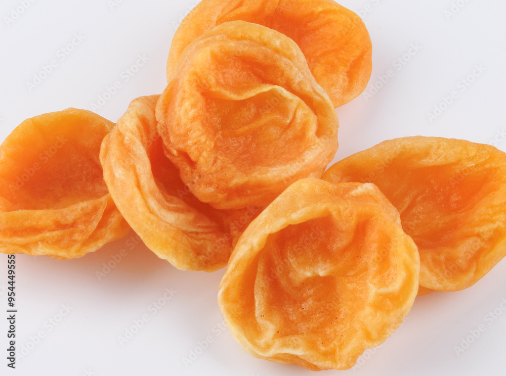 Sugar dried apricots on a white background. Sugar dried apricots on a white background.