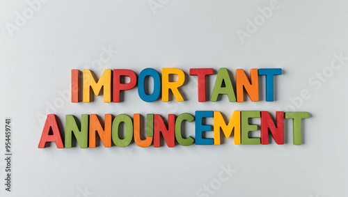 important announcement word colorful wooden letters on plain white background