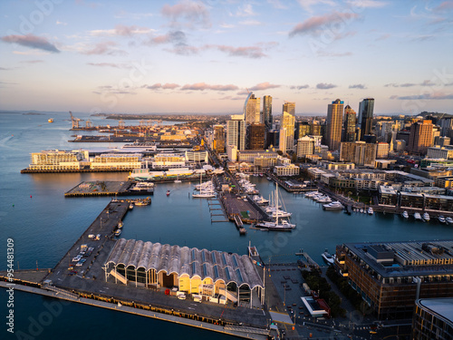 Auckland, New Zealand: Aerial view of the sunset over the Viaduct marina in the newly redeveloped wynyard district with Auckland business district skyline in New Zealand largest city