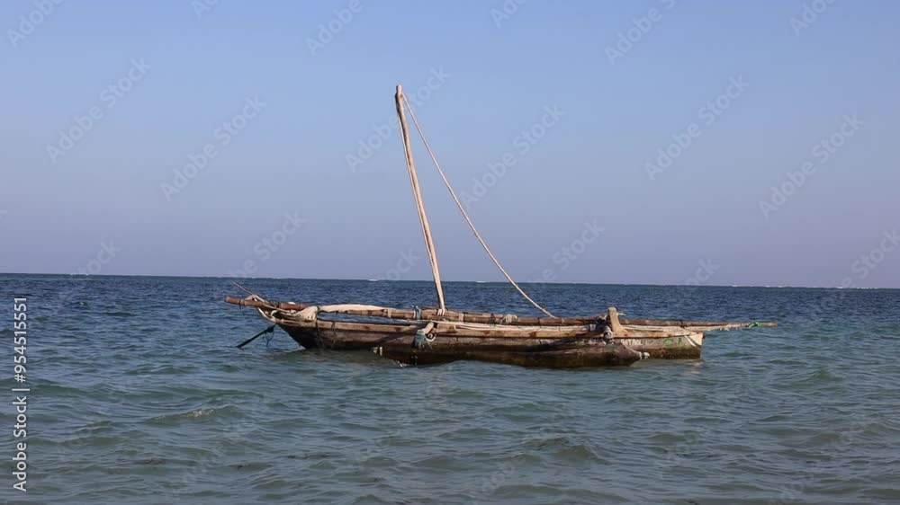 A traditional Boat at Diani Beach - Galu Beach - Kenya, Africa A traditional Boat at Diani Beach - Galu Beach - Kenya, Africa