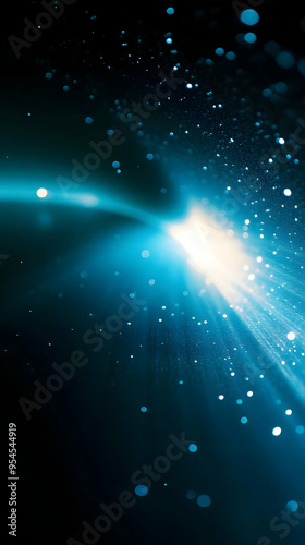 Abstract background with blue light and bokeh.