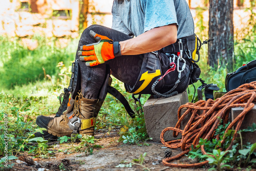 Different safety equipment for arborist or arborists such as ropes, anchors, straps and so on. Detail of arborist equipment.