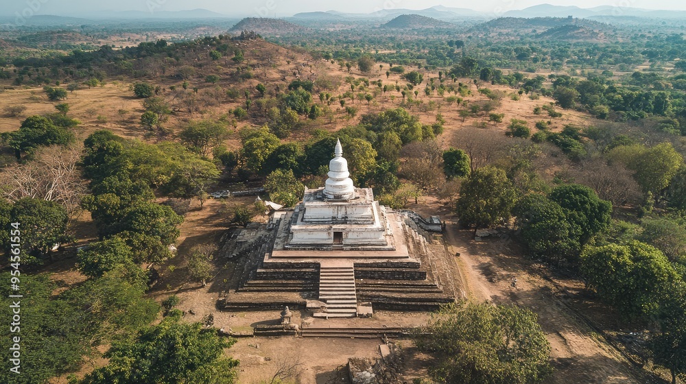 Bird's-eye view of the ancient Mihintale, with its white stupas, stone steps, and expansive surrounding landscapes Bird's-eye view of the ancient Mihintale, with its white stupas, stone steps, and expansive surrounding landscapes