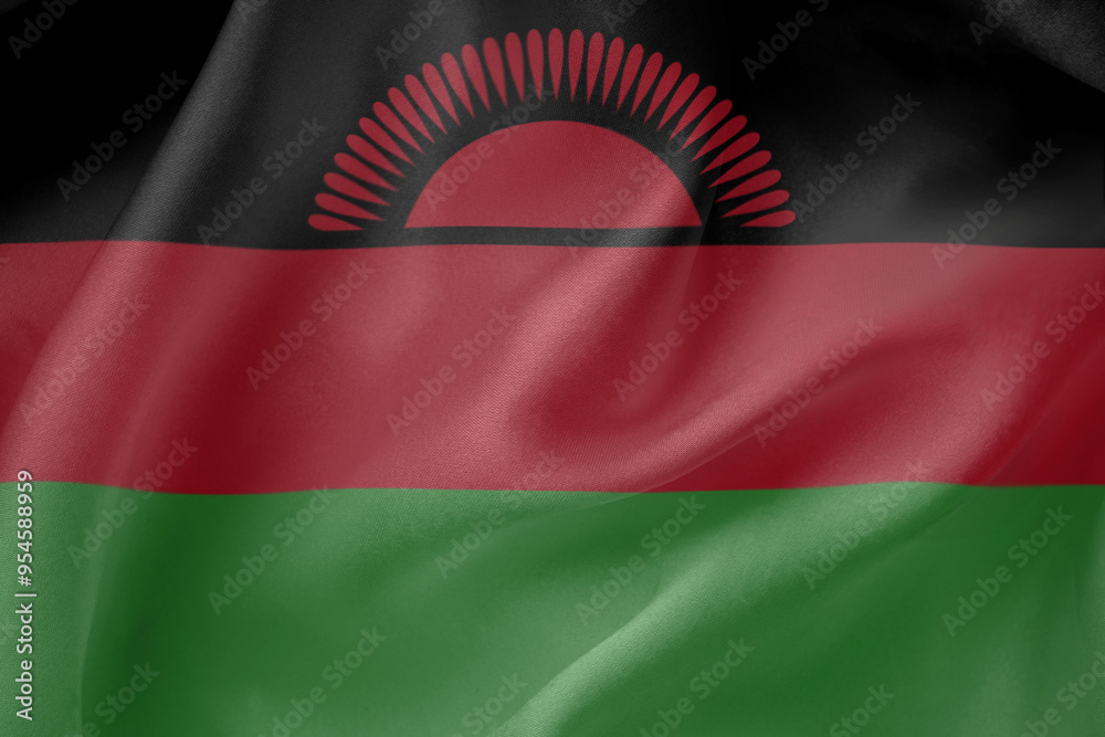 Fototapeta premium Malawi waving flag close up fabric texture background