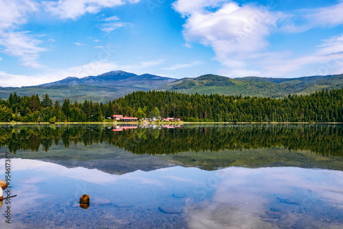 Mountain in the Distance with Forest, Lake Foreground, and Hotel on the Shore