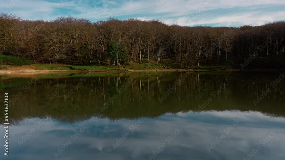 Mountain Lake With Clouds Reflected On The Watery Surface Mountain Lake With Clouds Reflected On The Watery Surface