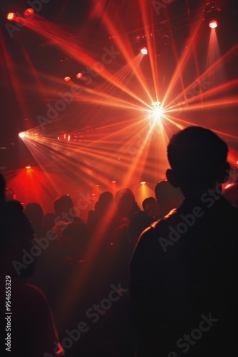 Vibrant Party Atmosphere with Colorful Lights and Blurred Crowd in Nightclub