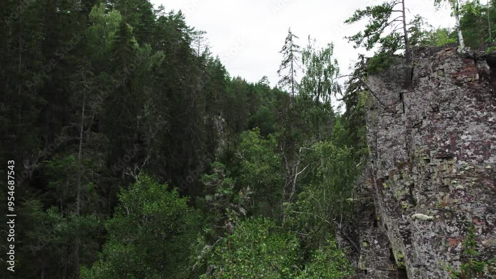 Fly over treetops and next to cliff at Moredalen Fly over treetops and next to cliff at Moredalen