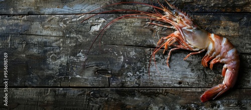 Fresh raw shrimp on a weath...