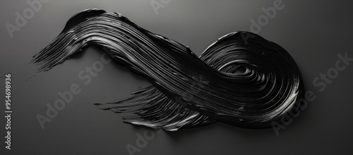 Black curved brushstroke te...