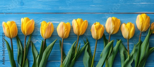 Yellow tulips on a rustic b...