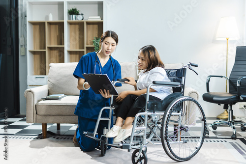 Friendly nurse doctor offering patient support during recovery. A loving caregiver taking care of her patient and showing kindness while doing a checkup in living home.