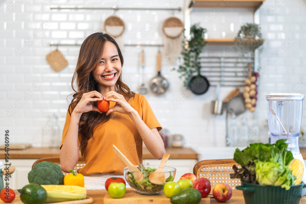 Portrait of beauty health asian woman having fun hold tomato cooking, vegan food healthy eat, fresh vegetable, Lycopene, vitamins, skincare, vegetarian in kitchen.Diet.Fitness, healthy food Portrait of beauty health asian woman having fun hold tomato cooking, vegan food healthy eat, fresh vegetable, Lycopene, vitamins, skincare, vegetarian in kitchen.Diet.Fitness, healthy food